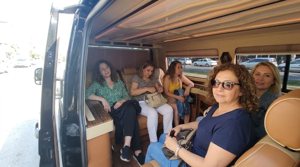 TORVIAN passengers in a private transfer vehicle