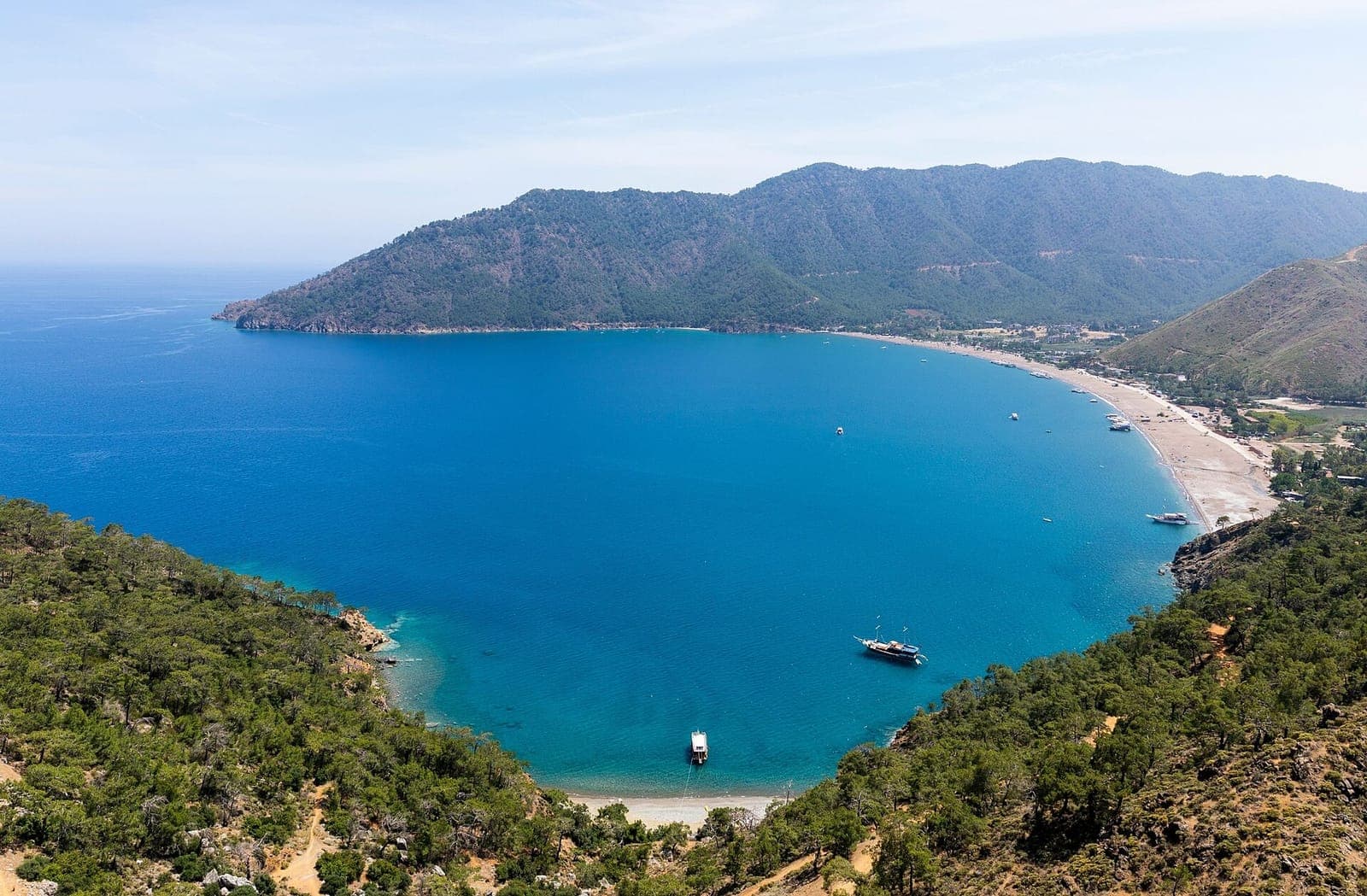 Adrasan bay and its beach seen from the wooded hills